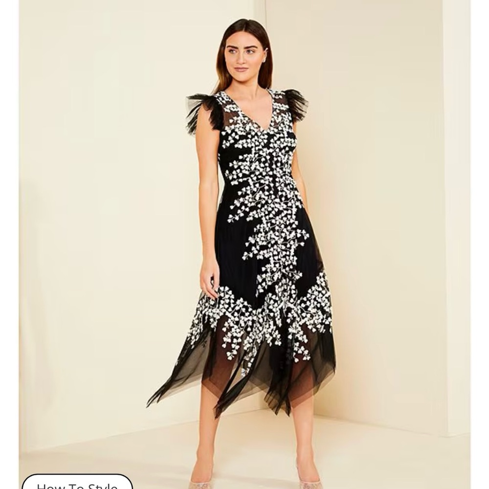 Size 16 beautiful black, white and gold. Alex Marie